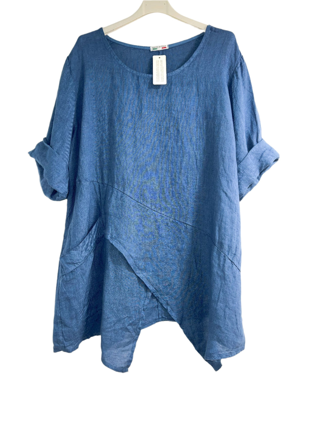 Blue asymmetrical linen tunic top with three-quarter sleeves.