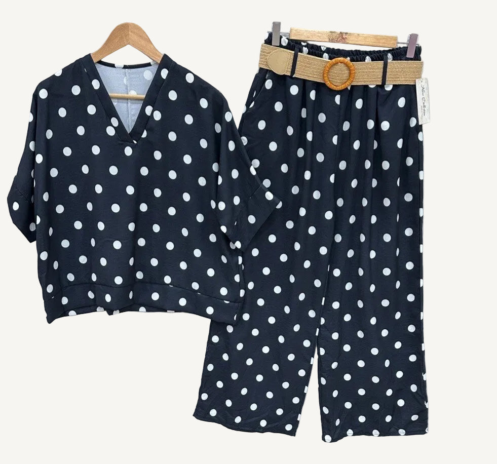 Black outfit with white polka dots 