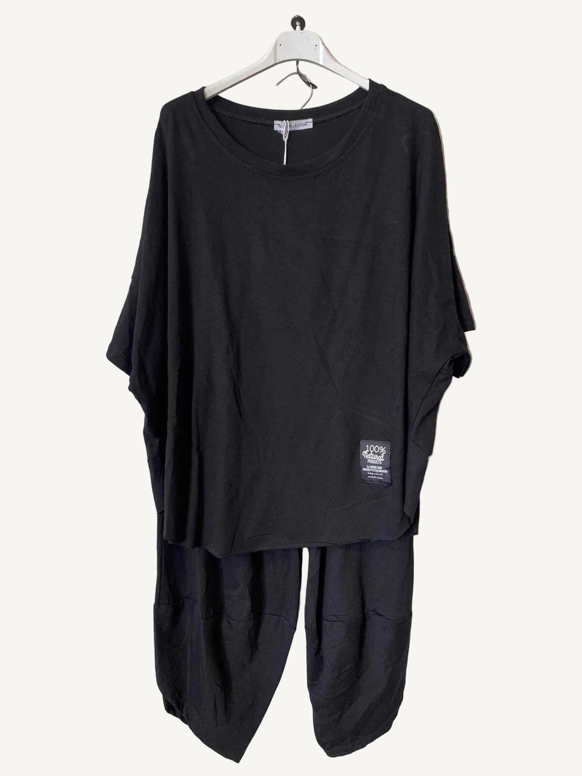 Black outfit with a top and pants in cotton and elastane