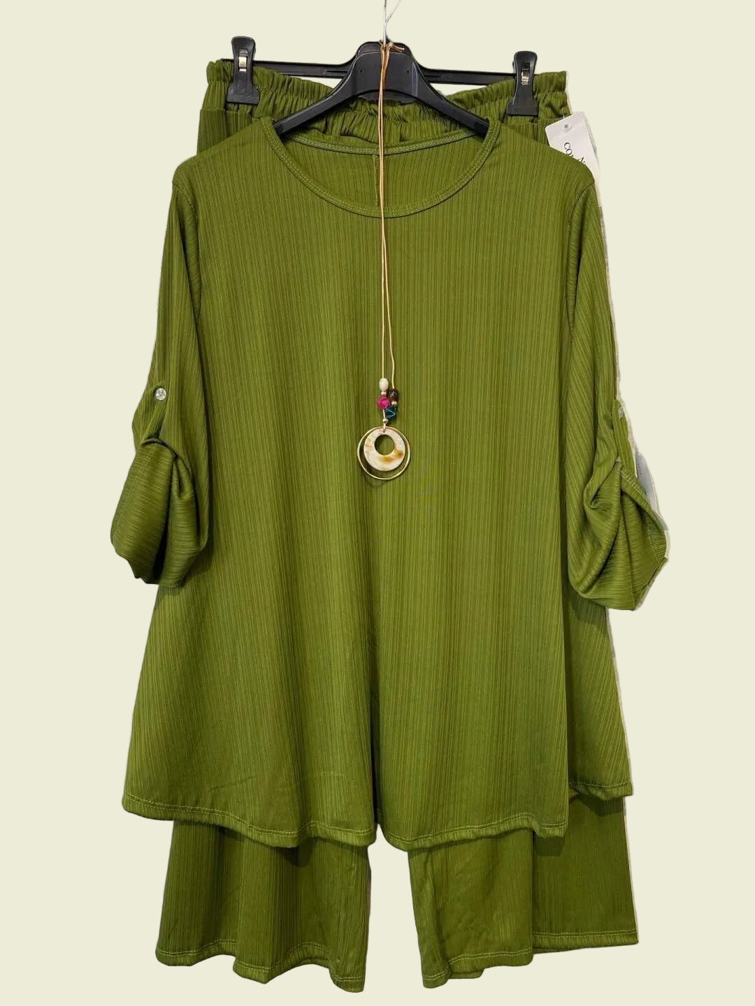 Green outfit two piece outfit trousers and top