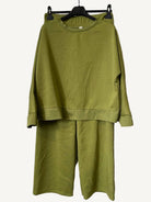 Olive Green outfit on a hanger 