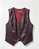 A dark plum faux-leather vest with a V-neck, three-button front, and side pockets, displayed flat against a light off-white background.