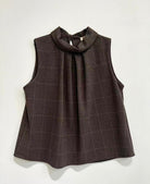 A sleeveless dark brown high-neck blouse with a subtle windowpane plaid pattern, displayed flat against a light off-white background.