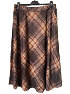 A brown plaid skirt with a warm rust-orange and beige pattern,
