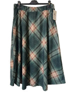 A plaid A-line skirt in dark green, dusty pink, and beige,