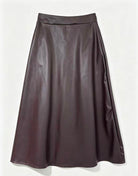 A burgundy leather A-line skirt with a wide waistband,