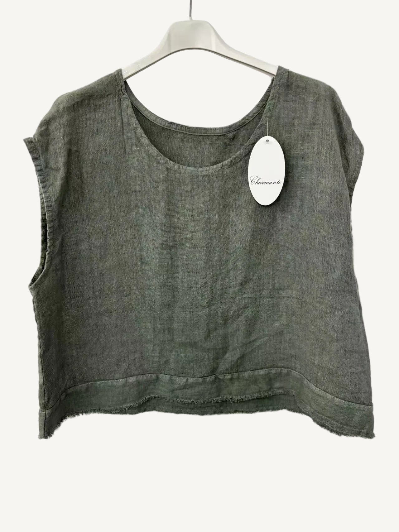 Green sleeveless top on a hanger with a visible brand tag against a white background