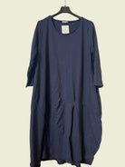 Navy blue dress on a hanger 