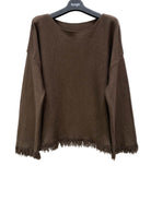 Brown sweater with frayed hem on a hanger against a white background