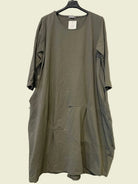 Green dress on a hanger 