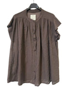 A brown short-sleeve button-front blouse