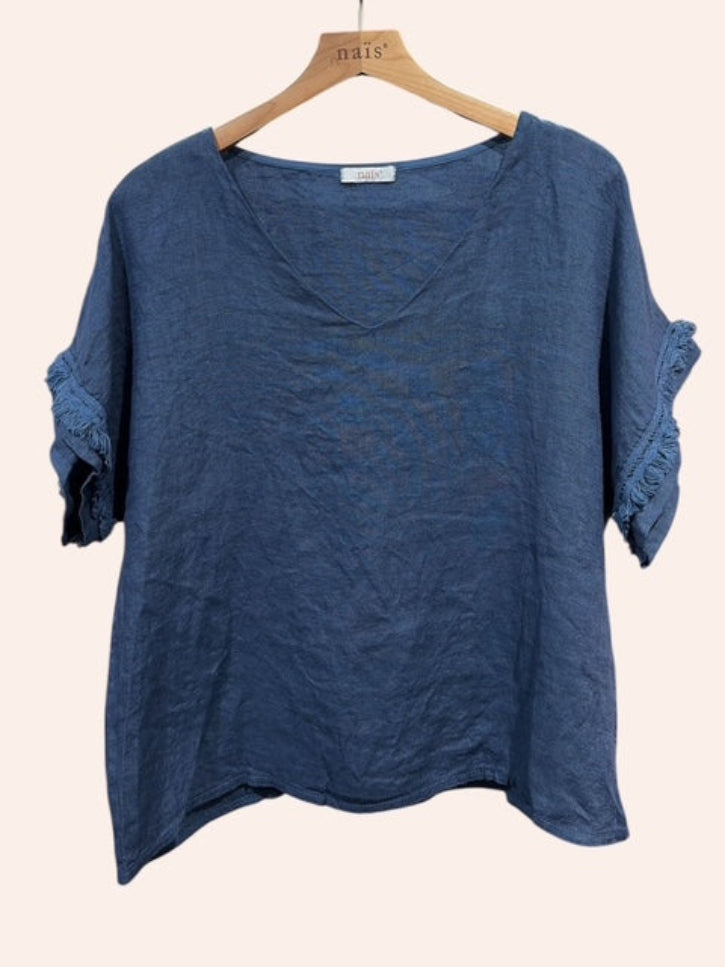 Navy Blue linen v neck top on a hanger against a white background