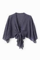 navy bolero with a knot detail on a white background