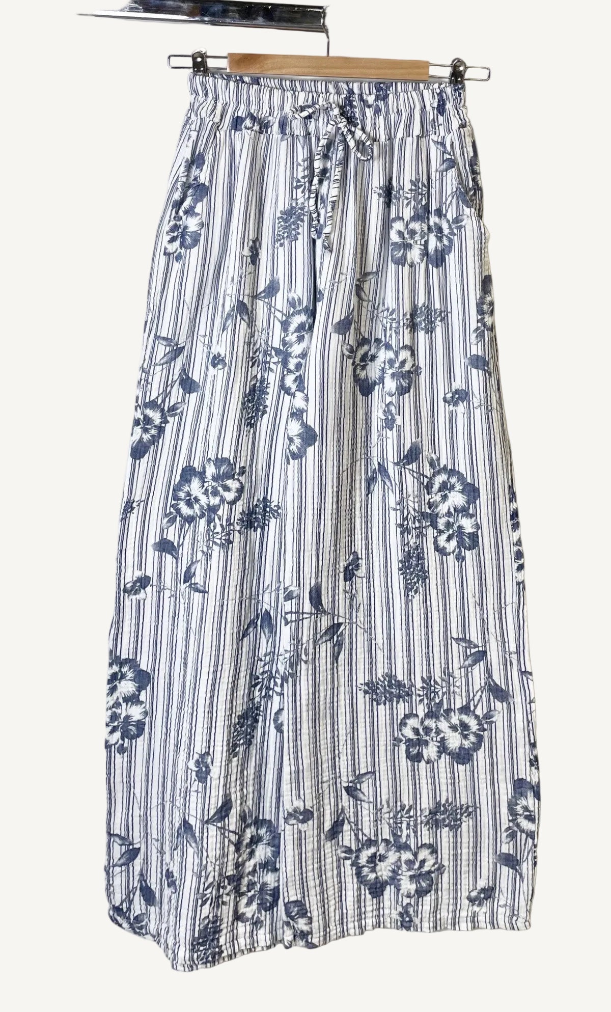 Blue and white floral and striped trousers