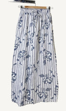 Blue and white floral and striped trousers