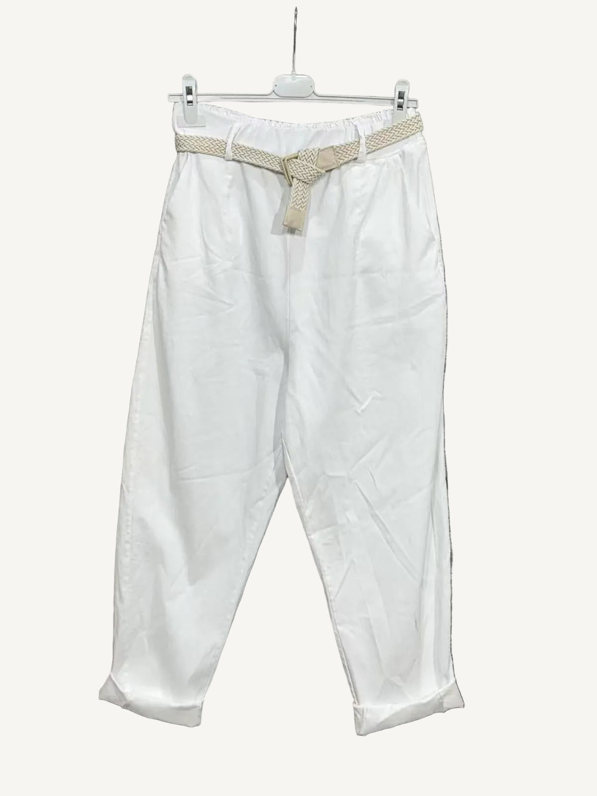 White pants with a belt 