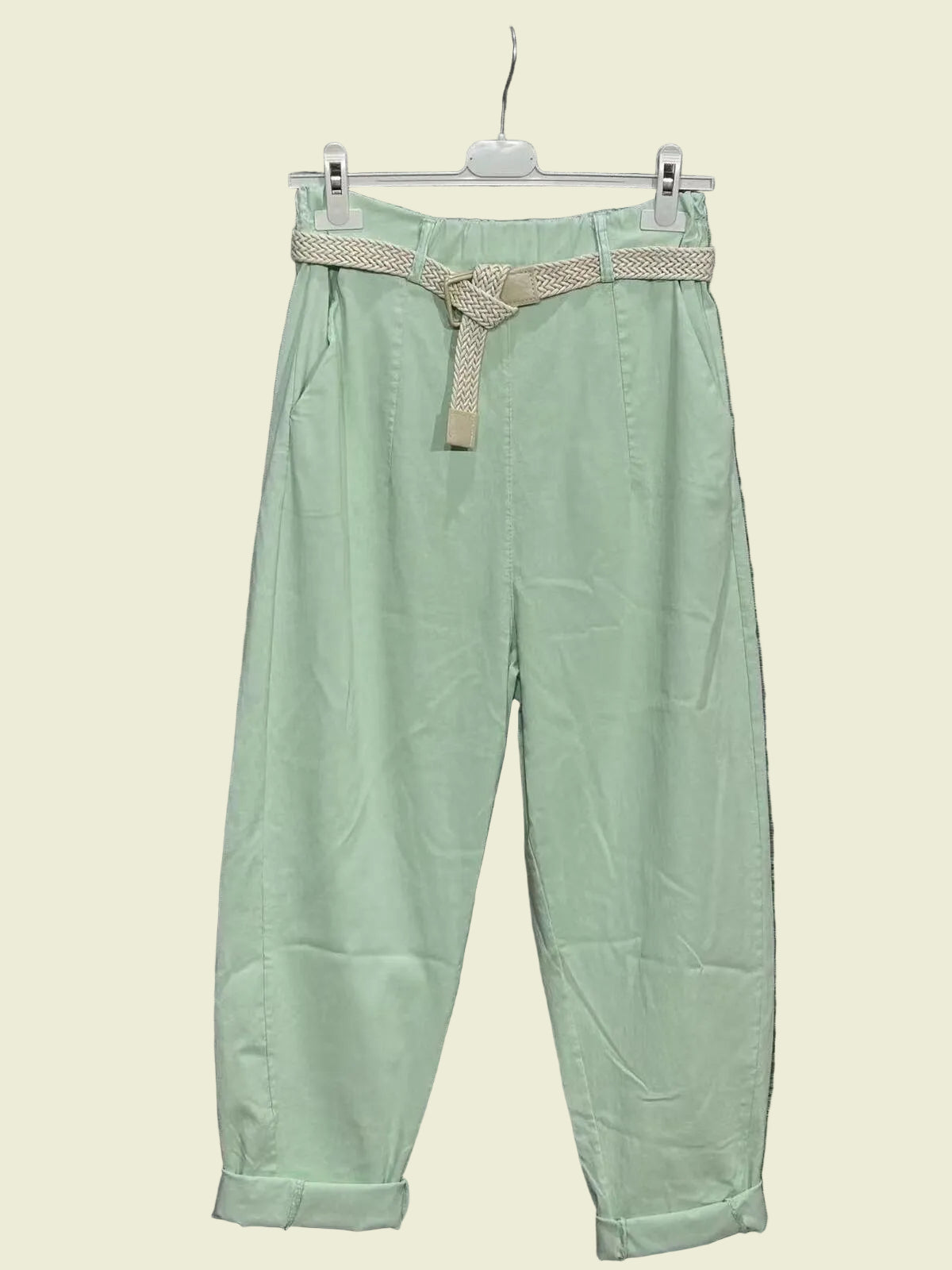 Light green pants with a belt