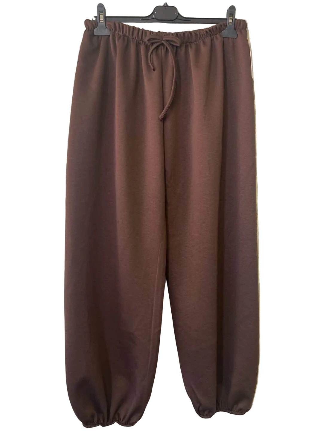 A pair of brown elasticated waist sweatpants in viscose and polyester