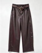 Burgundy faux leather wide-leg pants with a matching woven belt featuring a gold buckle, displayed flat against a light gray background.