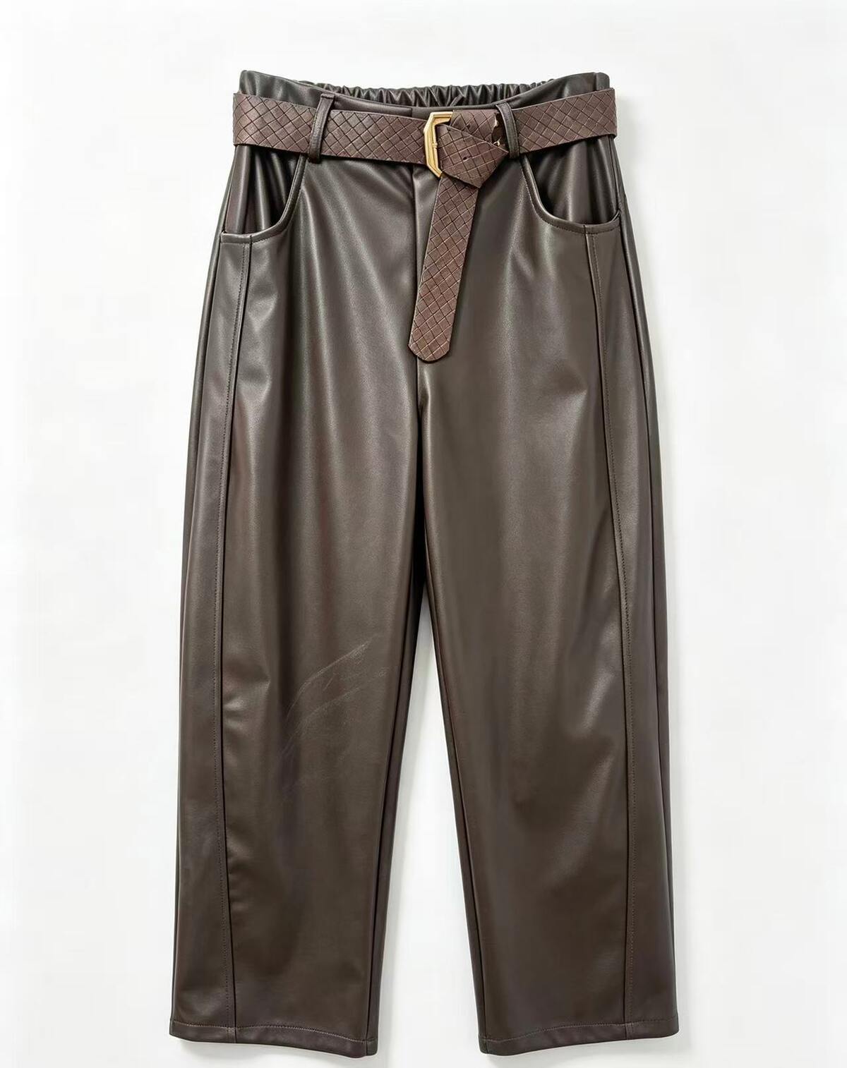 Dark brown faux leather cropped pants with a matching brown woven belt and gold buckle, displayed flat against a white background.