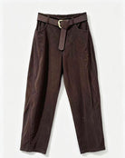 Dark brown wide-leg trousers with a matching patterned belt and gold-tone buckle, laid flat against a white background.