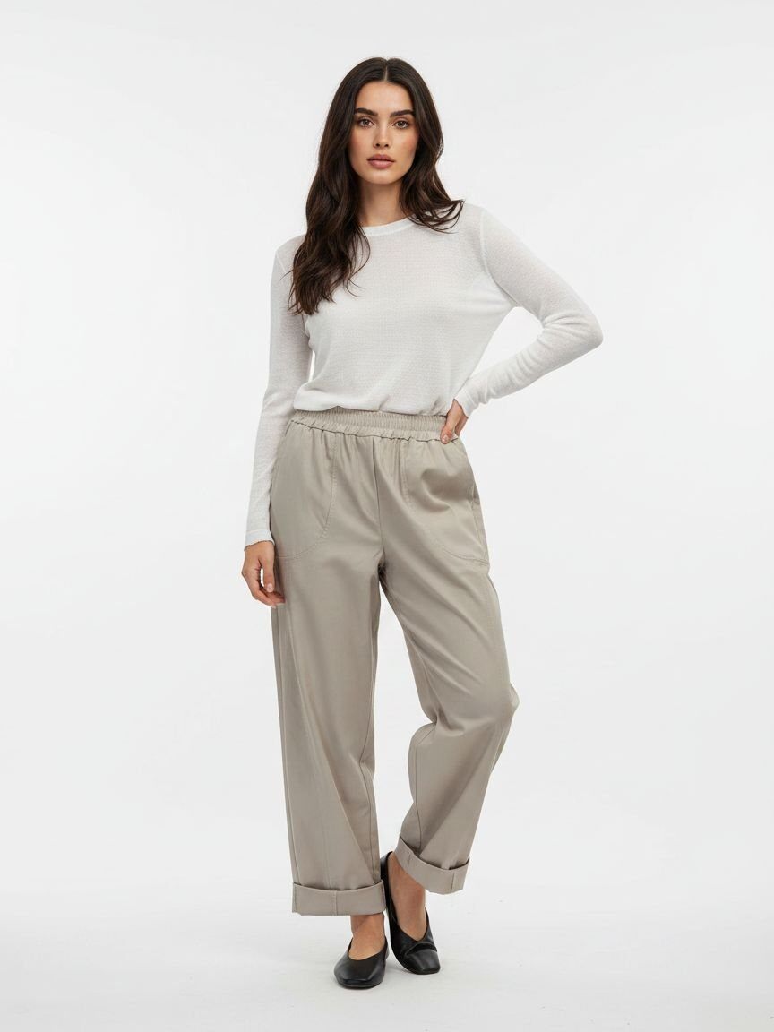 Cream coloured barrel trousers with elasticated waist