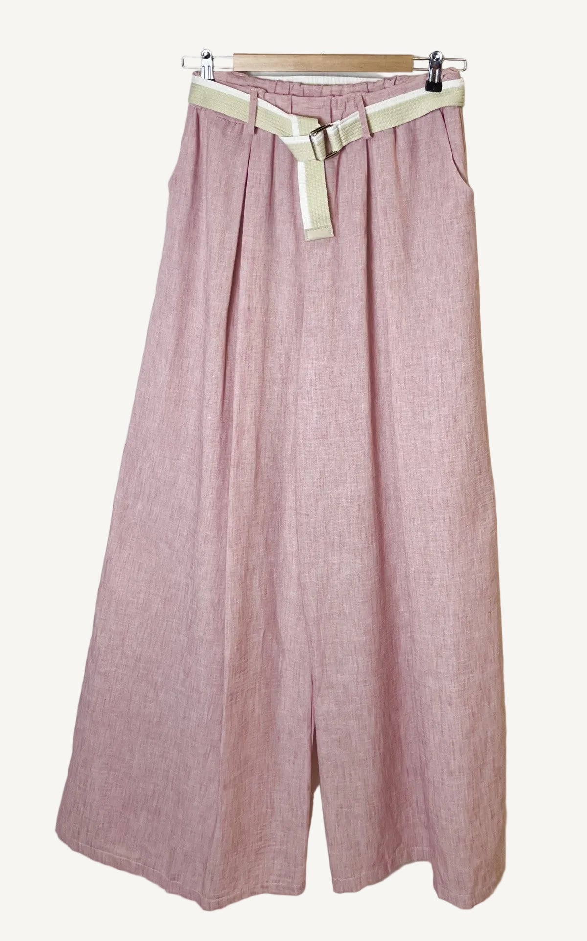 Pink pants with a belt on a white background