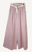 Pink pants with a belt on a white background