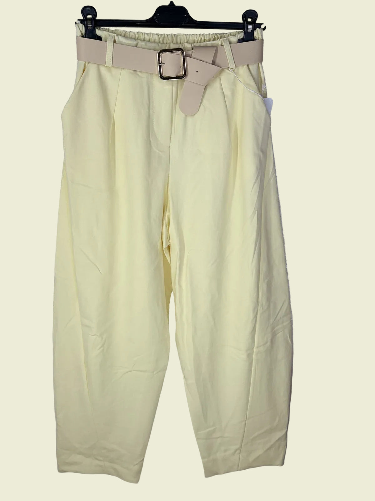 Light yellow pants with a belt 