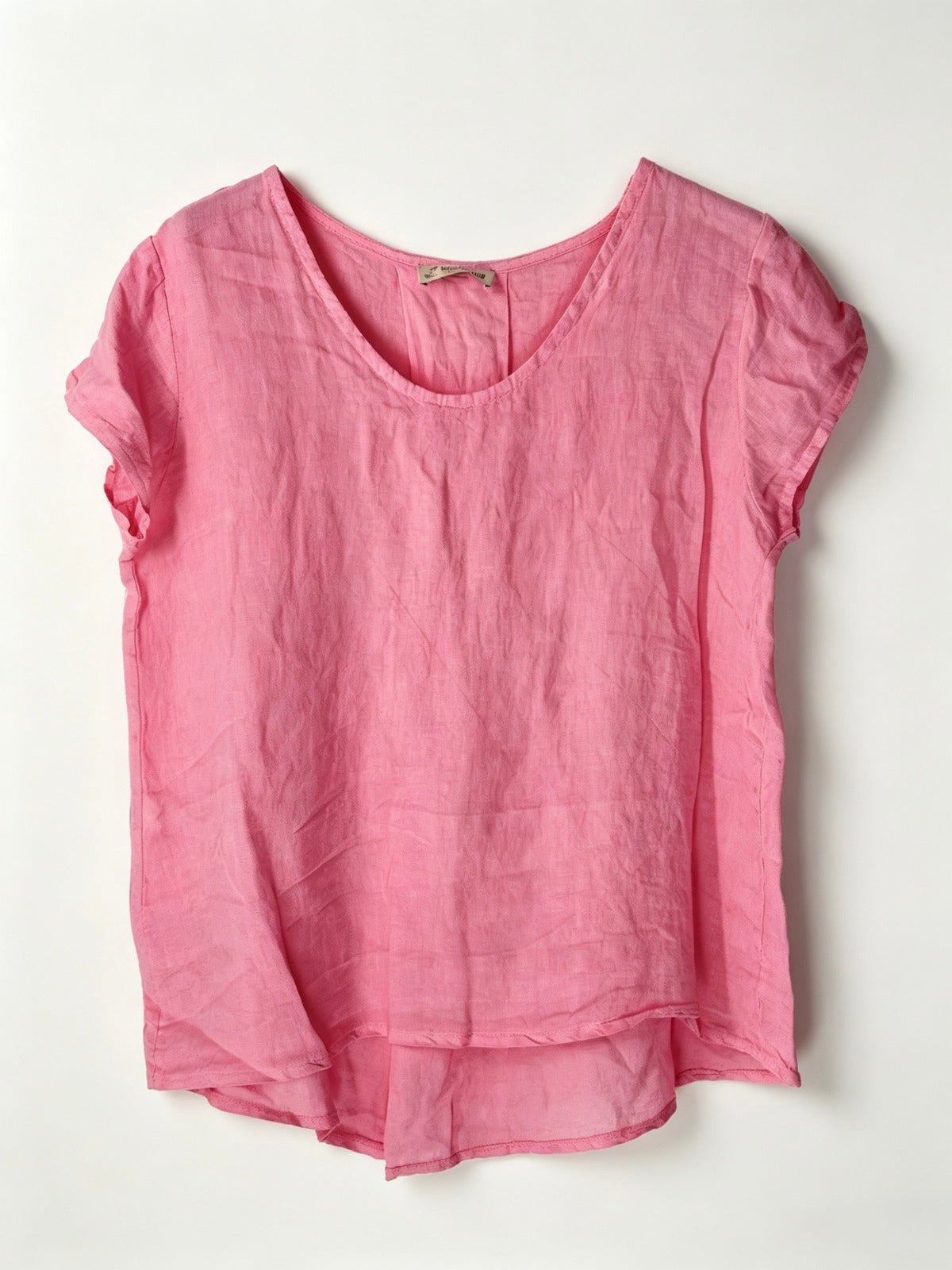 Pink short-sleeve top on a white background