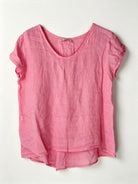 Pink short-sleeve top on a white background