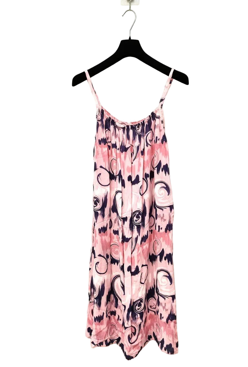 pink strappy dress on plain background