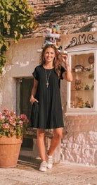 black pleated short sleeved dress