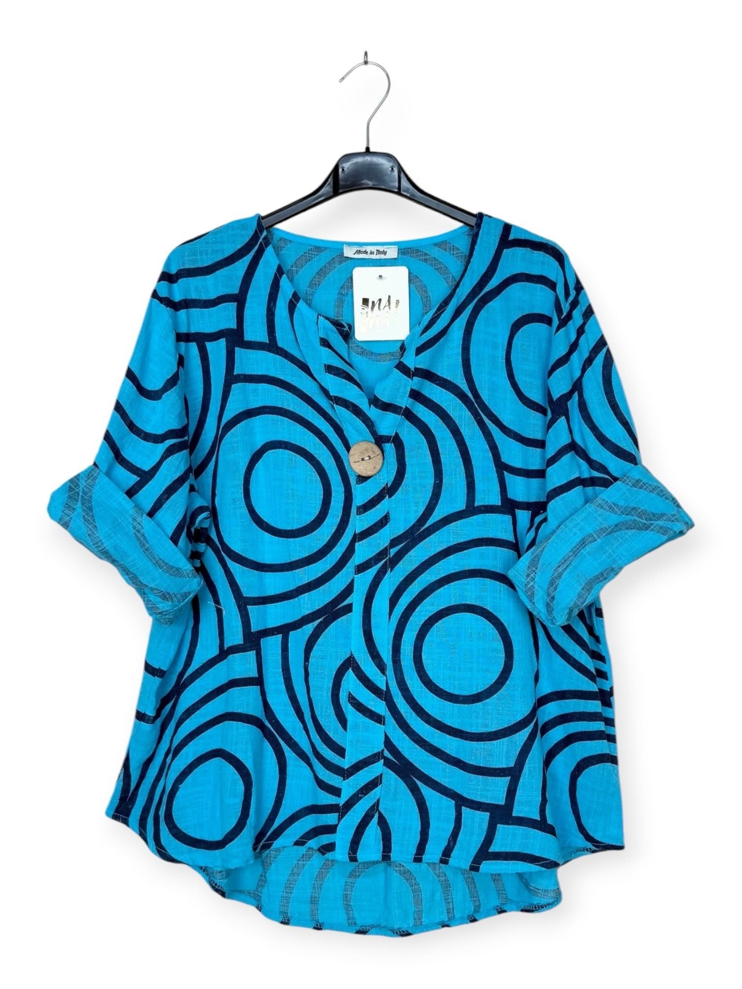 cyan printed top with feature large button