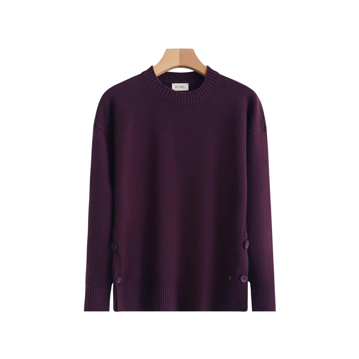 A dark purple long-sleeve knit sweater hanging on a wooden hanger