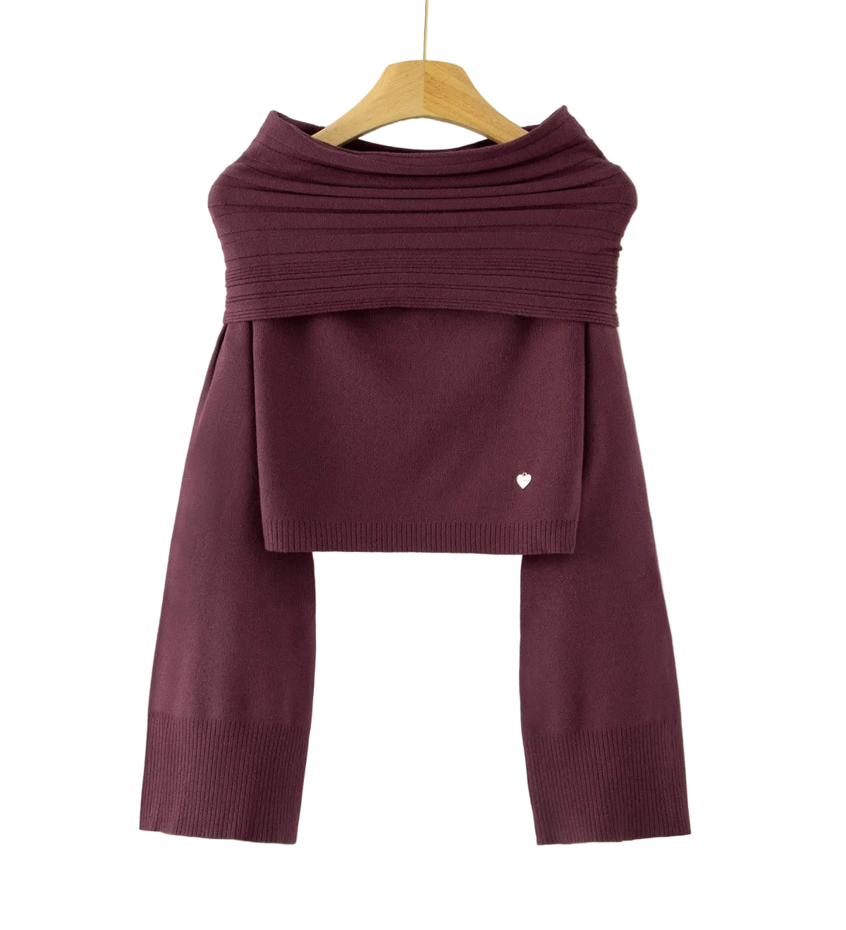 A dark plum purple knit long-sleeve top with a draped, layered cowl neck design, hanging on a wooden hanger against a plain white background. A small white heart detail is visible on the lower right of the front panel.