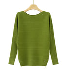 An olive green long-sleeve knit sweater with a crew neck, hanging on a wooden hanger against a white background. 