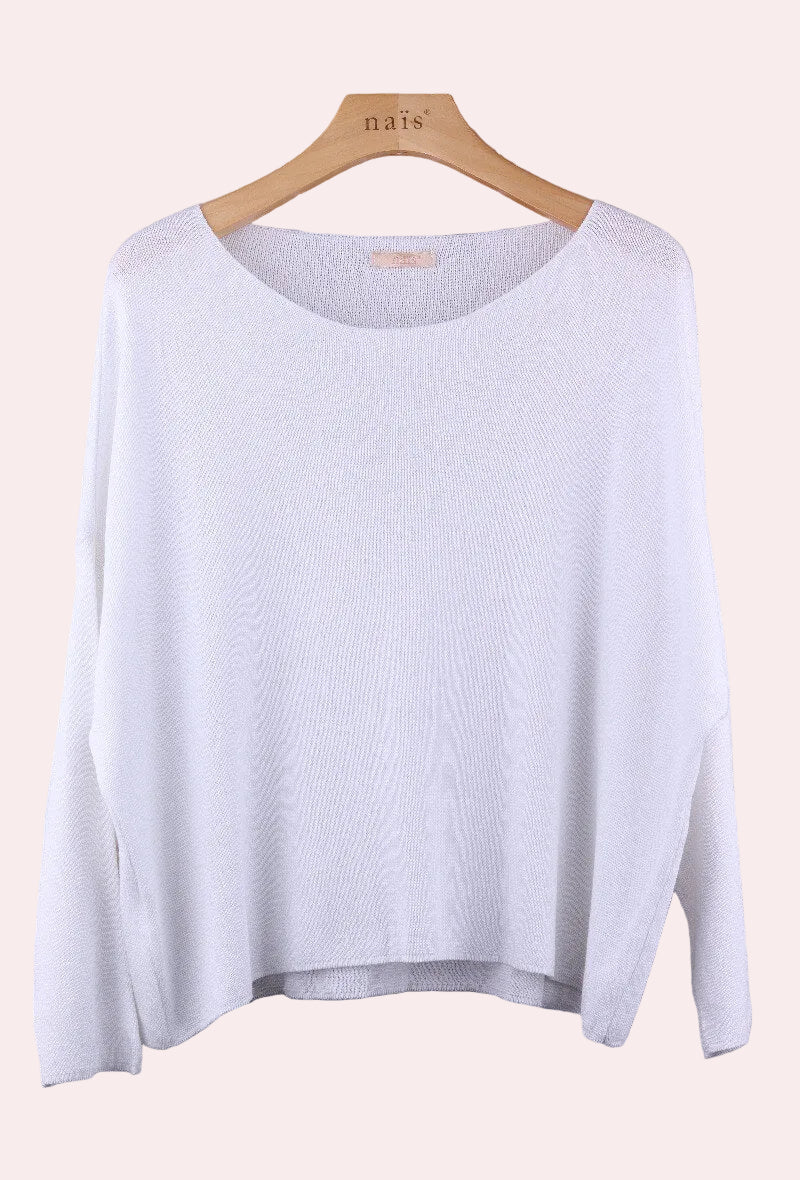 White sweater on a hanger