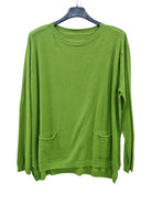 A bright green long-sleeve knit sweater with two front patch pockets, 