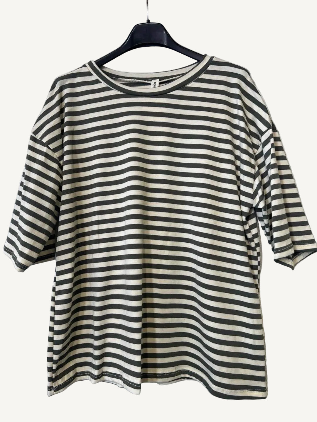 Striped T shirt on a hanger 