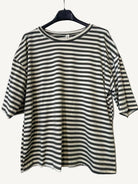 Striped T shirt on a hanger 