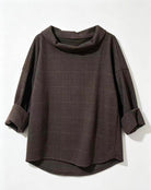 A dark brown cowl-neck top with a subtle windowpane plaid pattern, featuring rolled-up three-quarter sleeves with ribbed cuffs, shown against a plain white background.