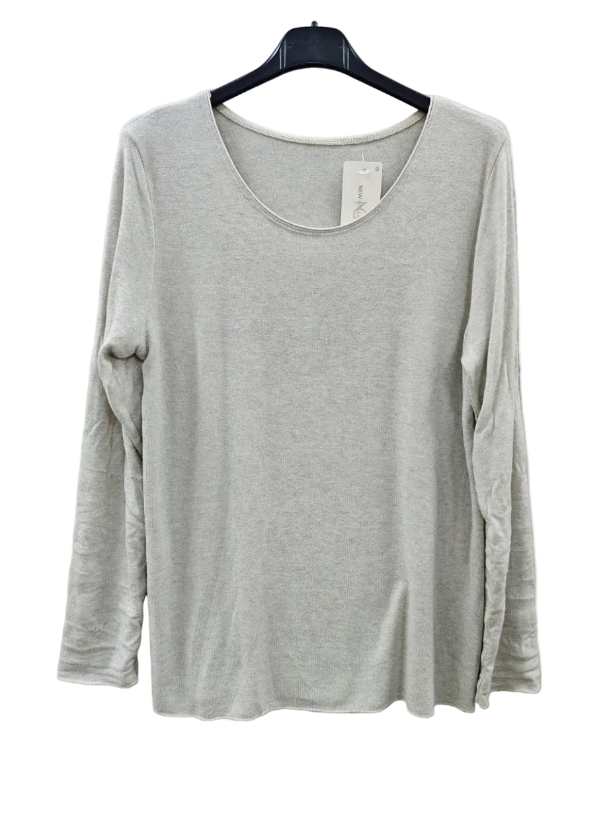 An ivory long-sleeve scoop neck top hanging on a black hanger against a textured light gray wall.