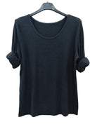 A black long-sleeve scoop-neck top with rolled cuffs, 