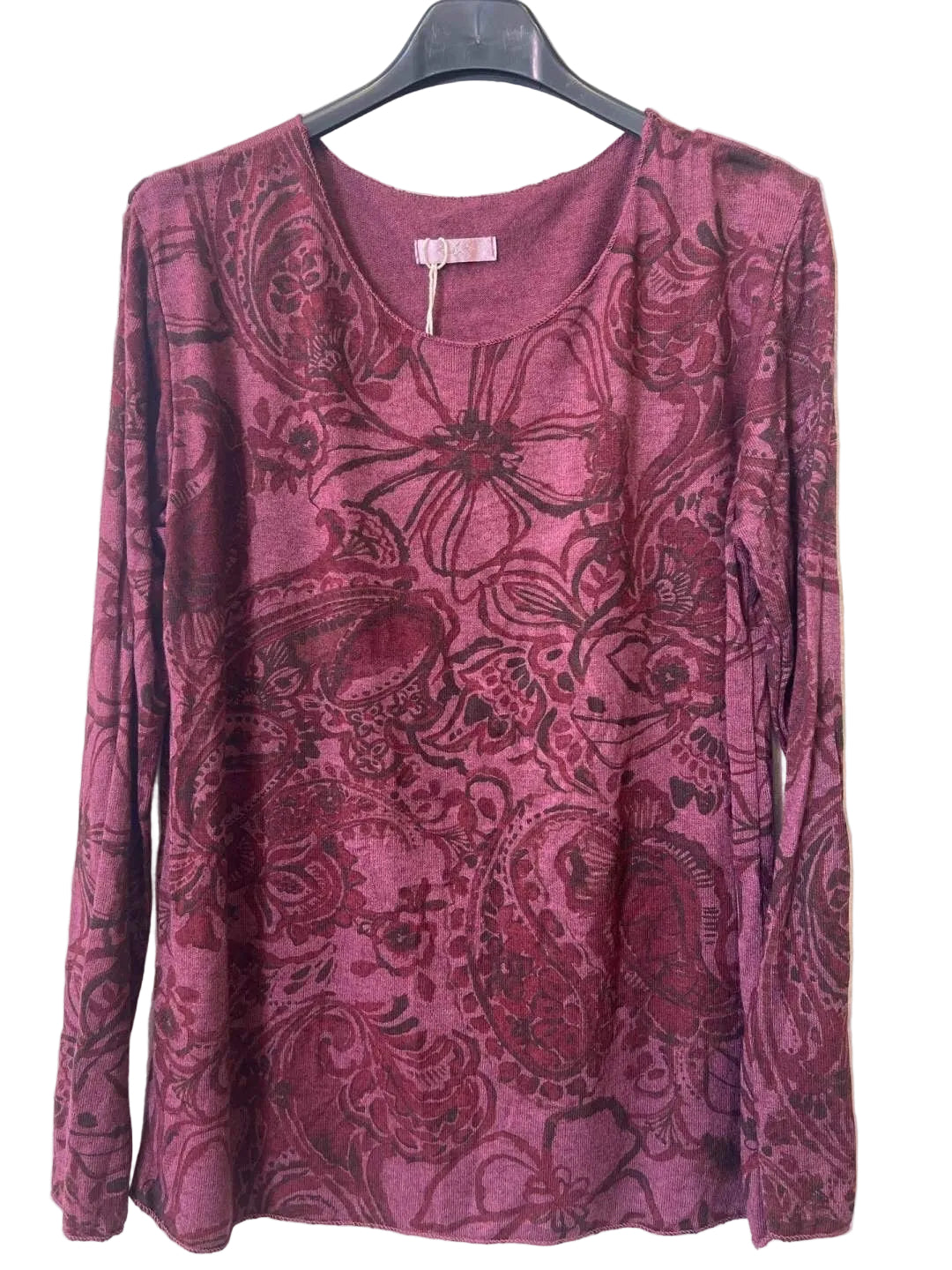 A long-sleeve scoop-neck top in a dusty rose or mauve color, featuring a dark paisley and floral jacquard pattern.