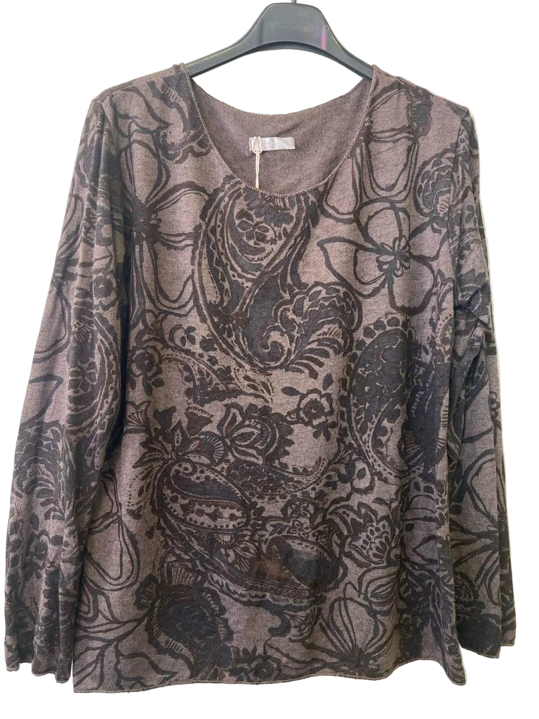 A women's long-sleeve top with a brown and black paisley floral pattern,