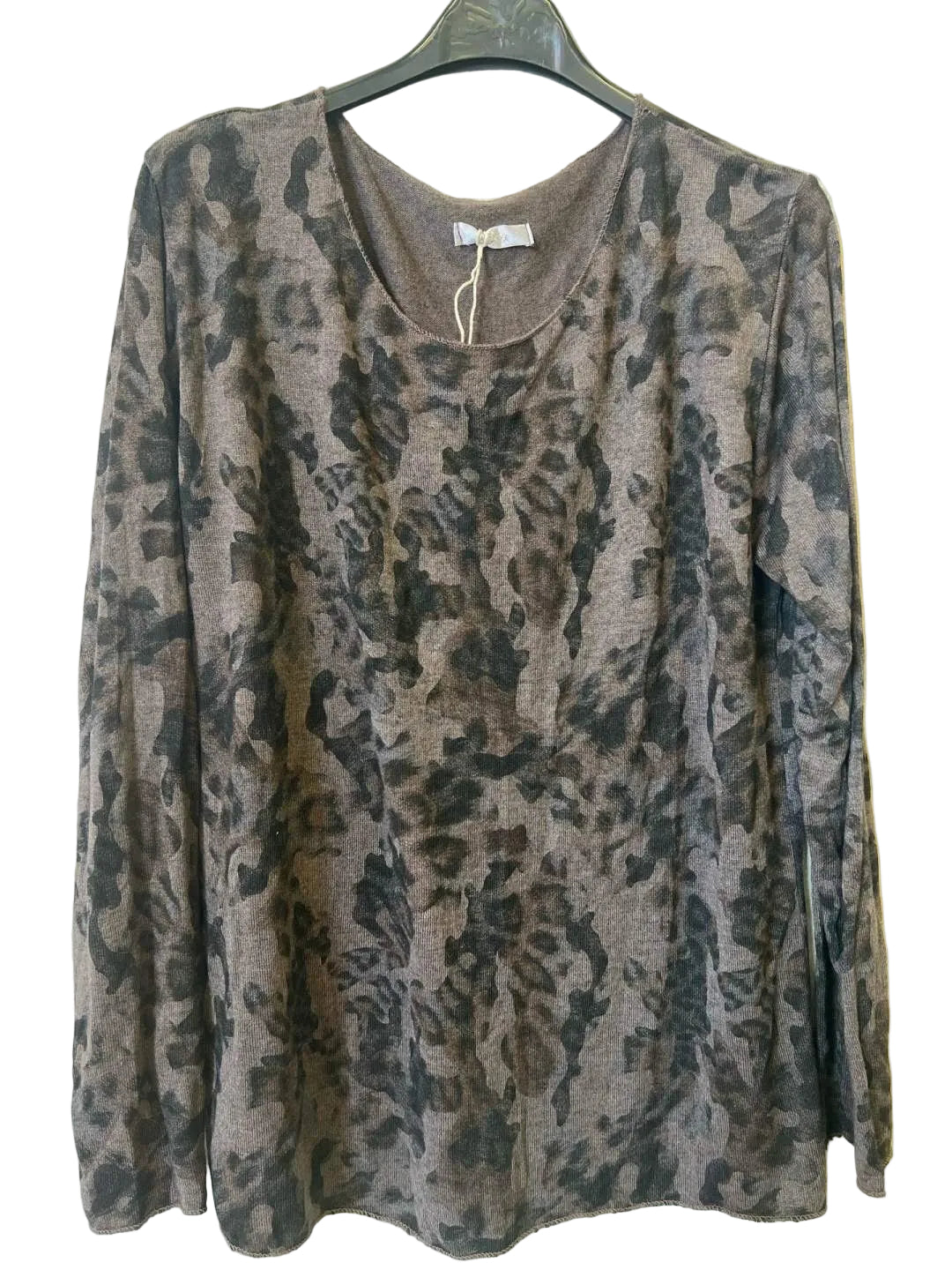 A long-sleeve crewneck top with an abstract camouflage print in brown, gray, and black