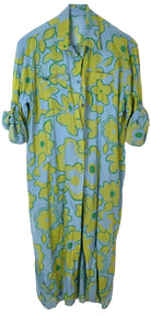 A blue button-up shirt dress with a retro floral pattern in yellow and green, featuring rolled-up sleeves and a pointed collar.