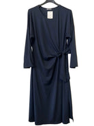 A dark navy blue long-sleeve dress with a knotted waist,