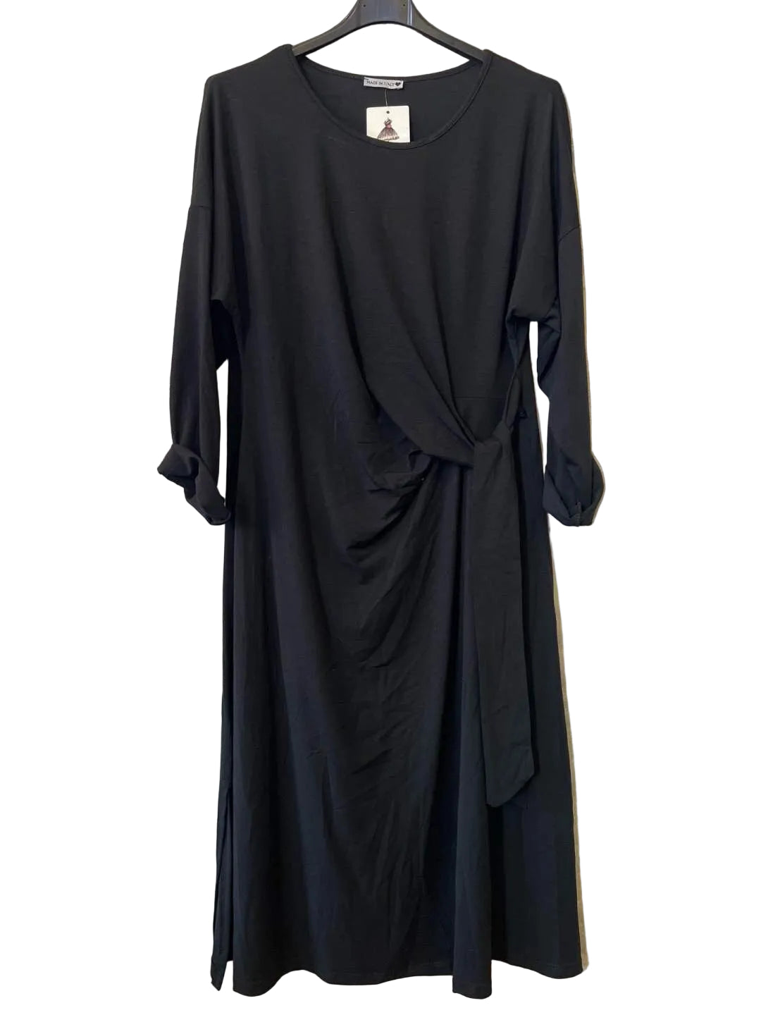 A black long-sleeve wrap-style dress with a draped front and side slit, 